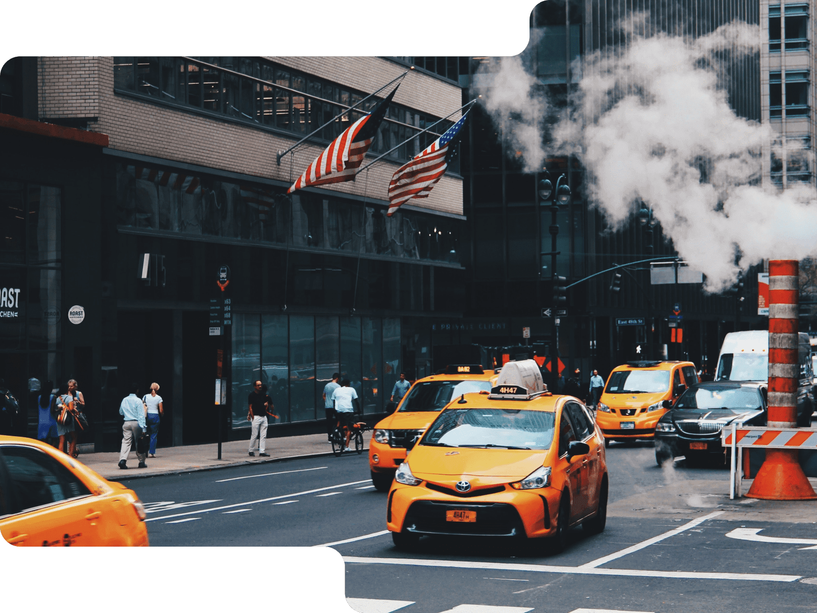 Busy city street with many taxis